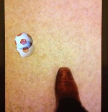 SoccerAR: Augmented Reality with a Kick